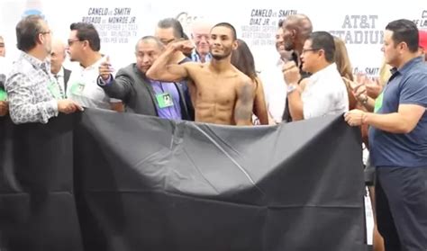 Watch as boxer Andrew Cancio gets NAKED for weigh